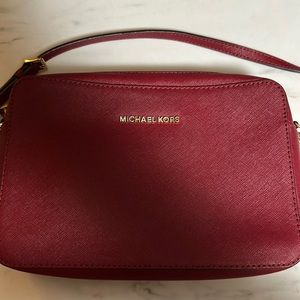 Reddish Micheal Kors leather bag gently used